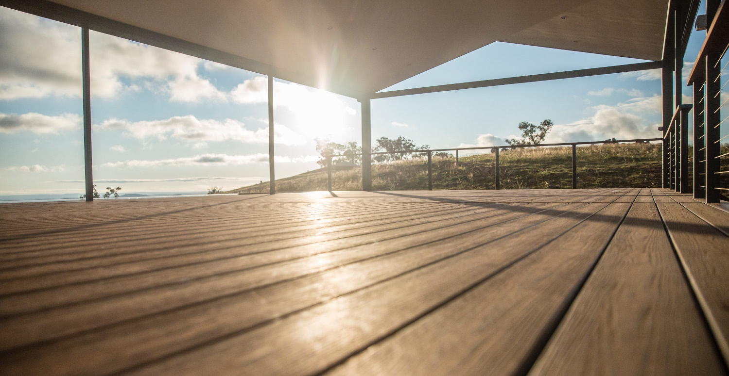 Merbau decking under the pergola and sunset view