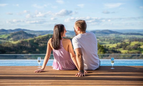 A couple sitting on a composite floating deck