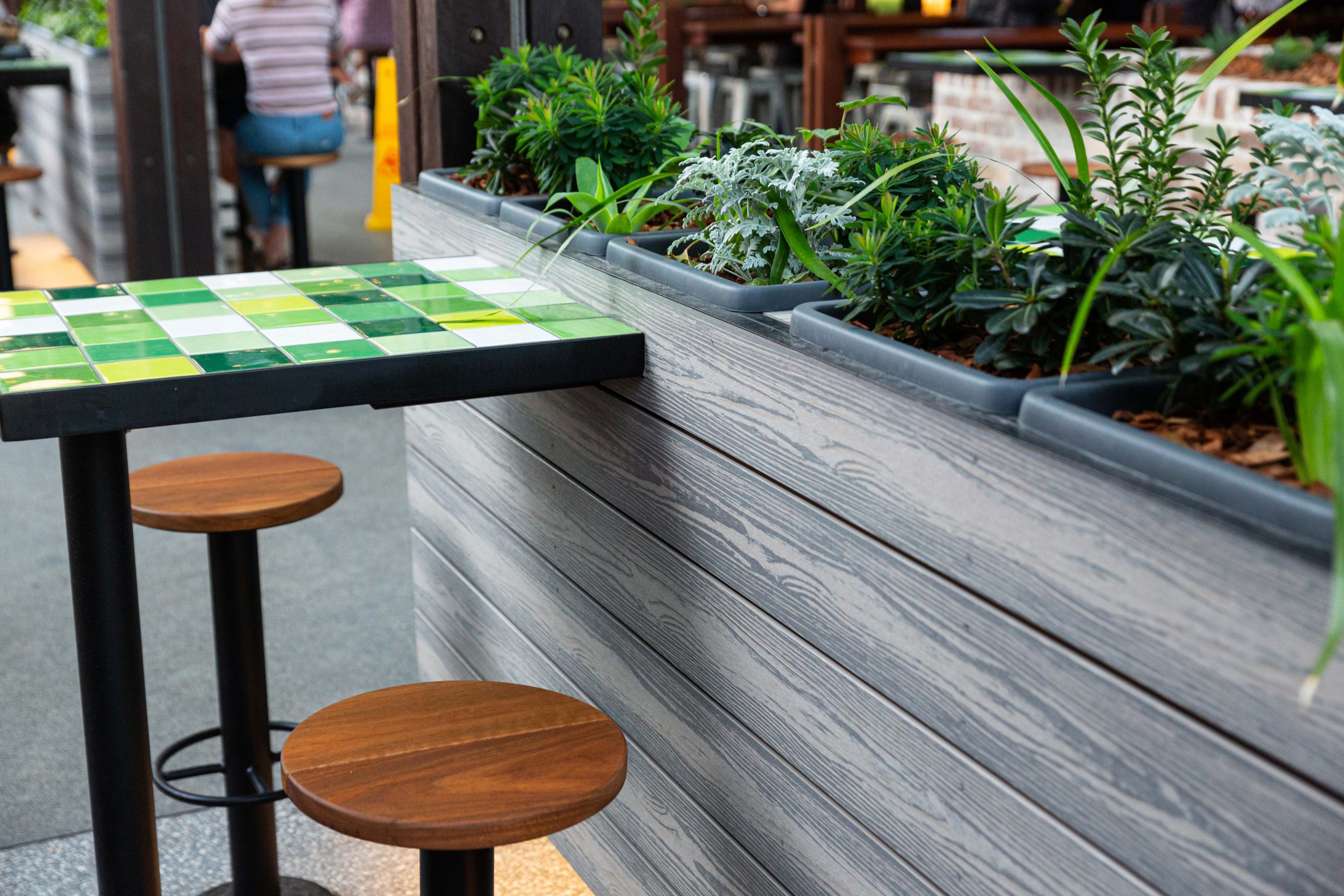 Planter boxes made from grey-silver composite decking boards